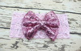 Childrens Big Sequined Bow with Lace Headband Hair AccessoryA cute girls Big Sequined Bow with Lace Headband Hair Accessory.
This elasticated sequined headband is a great way of dressing up and glamorising any outfit.These arlavishhairandbeauty.comChildrens Big Sequined Bow