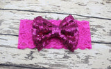 Childrens Big Sequined Bow with Lace Headband Hair AccessoryA cute girls Big Sequined Bow with Lace Headband Hair Accessory.
This elasticated sequined headband is a great way of dressing up and glamorising any outfit.These arlavishhairandbeauty.comChildrens Big Sequined Bow
