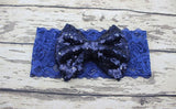 Childrens Big Sequined Bow with Lace Headband Hair AccessoryA cute girls Big Sequined Bow with Lace Headband Hair Accessory.
This elasticated sequined headband is a great way of dressing up and glamorising any outfit.These arlavishhairandbeauty.comChildrens Big Sequined Bow