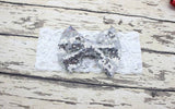 Childrens Big Sequined Bow with Lace Headband Hair AccessoryA cute girls Big Sequined Bow with Lace Headband Hair Accessory.
This elasticated sequined headband is a great way of dressing up and glamorising any outfit.These arlavishhairandbeauty.comChildrens Big Sequined Bow